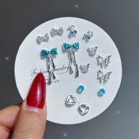 پک گوشواره پاپیون آبی ۷ جفتی