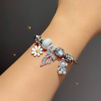 دستبند پاندورا پاپیون و هدفون و بابونه