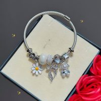دستبند پاندورا پاپیون و هدفون و بابونه
